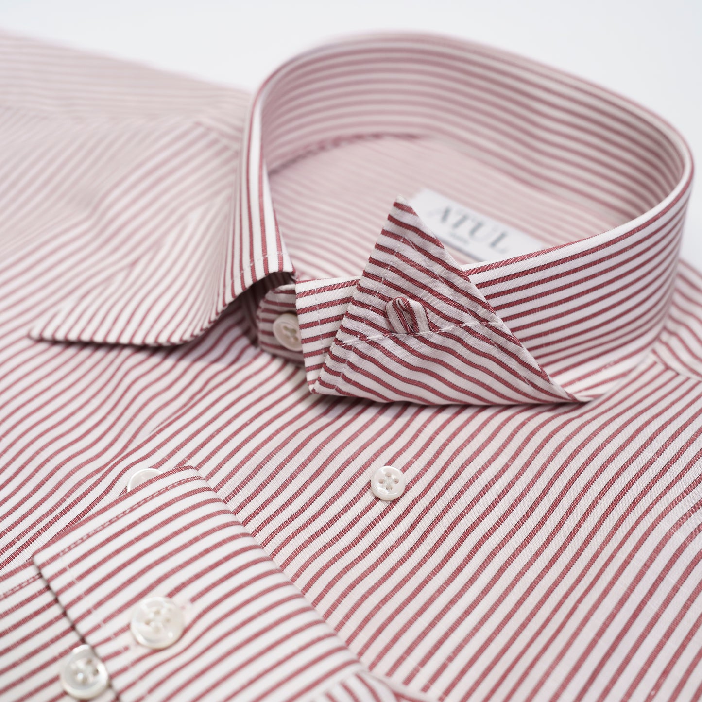 LA CHEMISE À RAYURES ROUGE BRIQUE