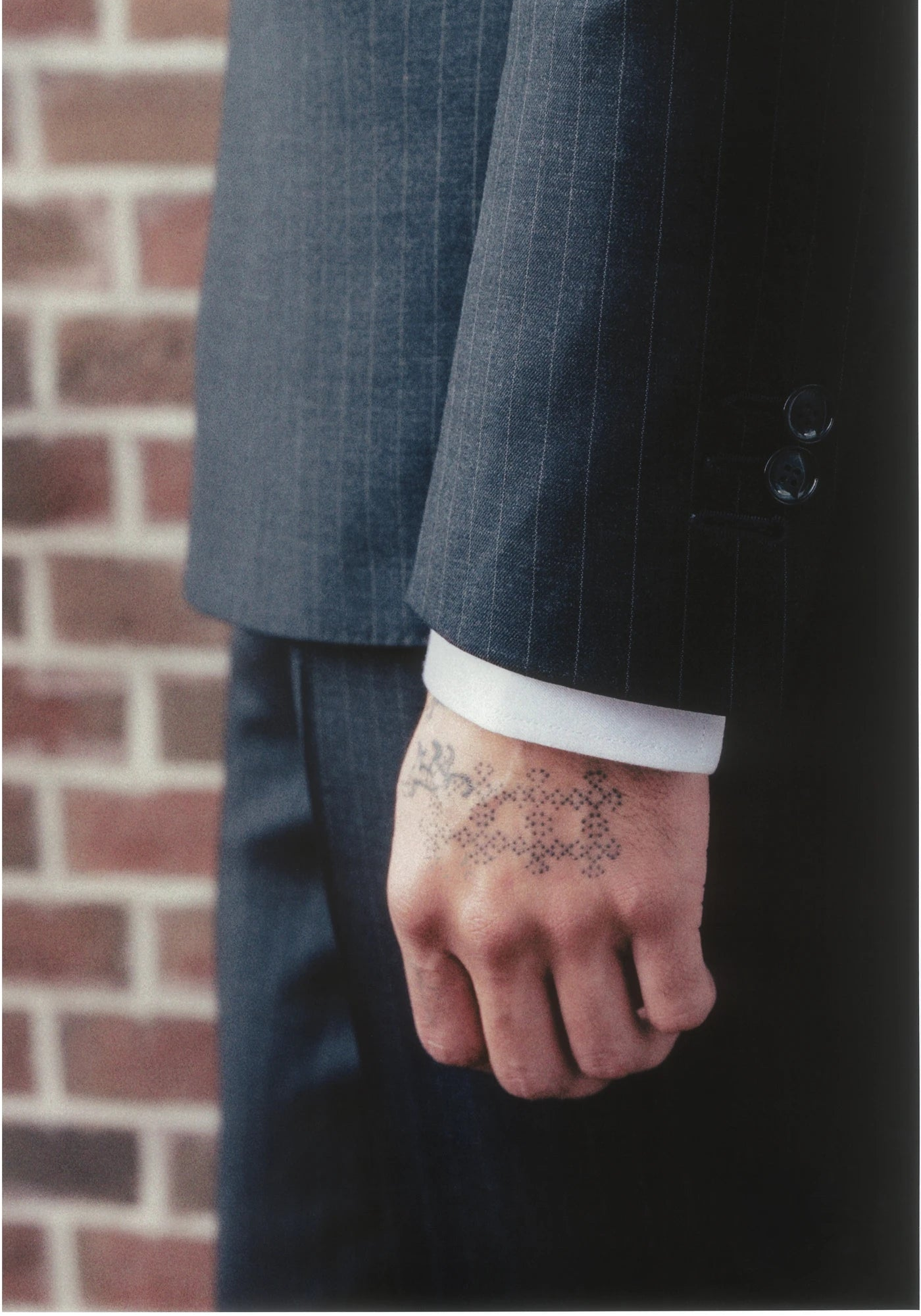 THE DOUBLE-BREASTED SUIT IN SUPER 120’S FOUR-SEASON WOOL - DARK GREY PINSTRIPES